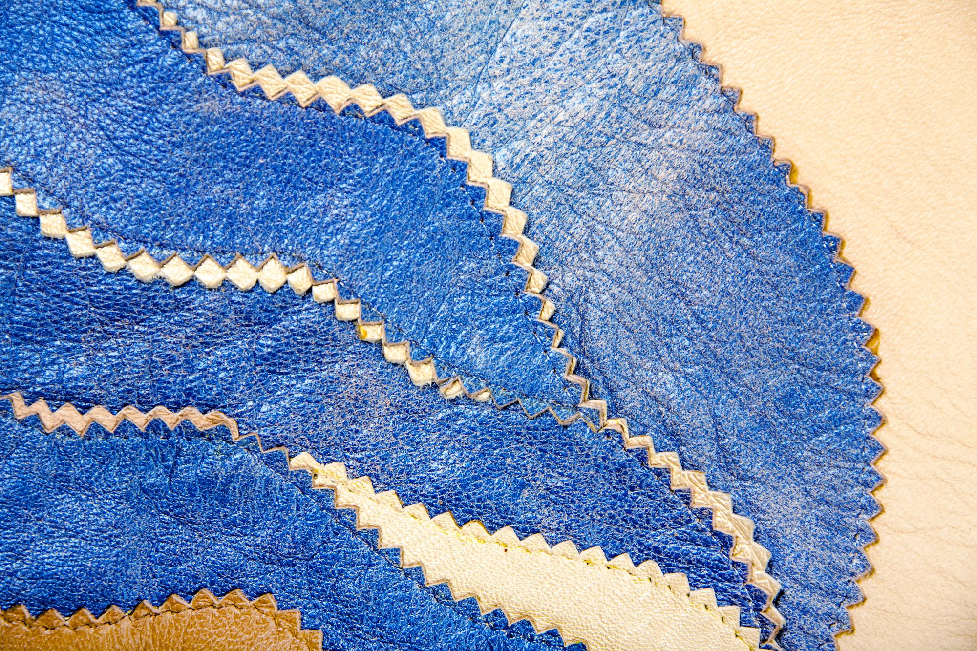 textured satin-stitch sample in blue